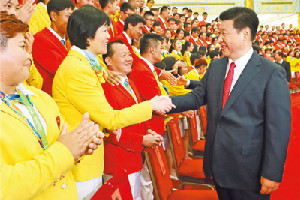 习近平在会见第31届奥运会中国体育代表团时表示:中国队加油！中国加油！